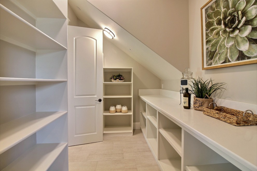 This is an example of an expansive classic l-shaped kitchen pantry in Portland with a submerged sink, recessed-panel cabinets, white cabinets, engineered stone countertops, white splashback, ceramic splashback, stainless steel appliances, dark hardwood flooring, multiple islands, brown floors and grey worktops.