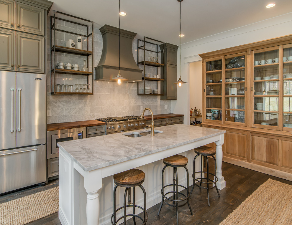 Transitional galley kitchen photo in Nashville with a double-bowl sink, open cabinets, white backsplash and stainless steel appliances