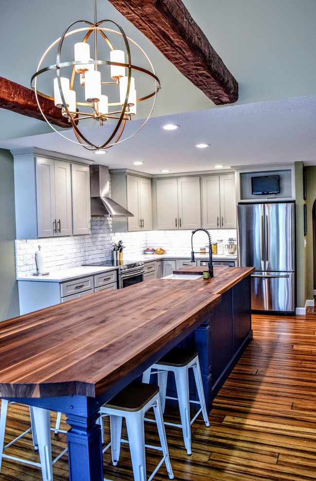 Walnut and Navy Kitchen Remodel Transitional Kitchen Cedar Rapids by Jocelyn Pankey