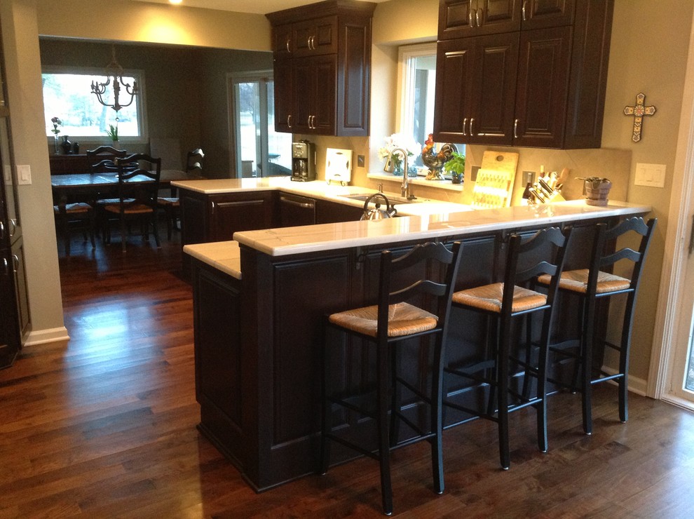 Walnut with a walnut floor Traditional Kitchen Kansas