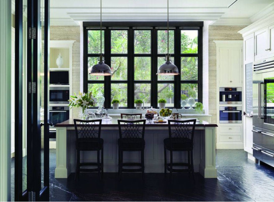 Kitchen - traditional black floor kitchen idea in London with shaker cabinets, white cabinets and stainless steel appliances
