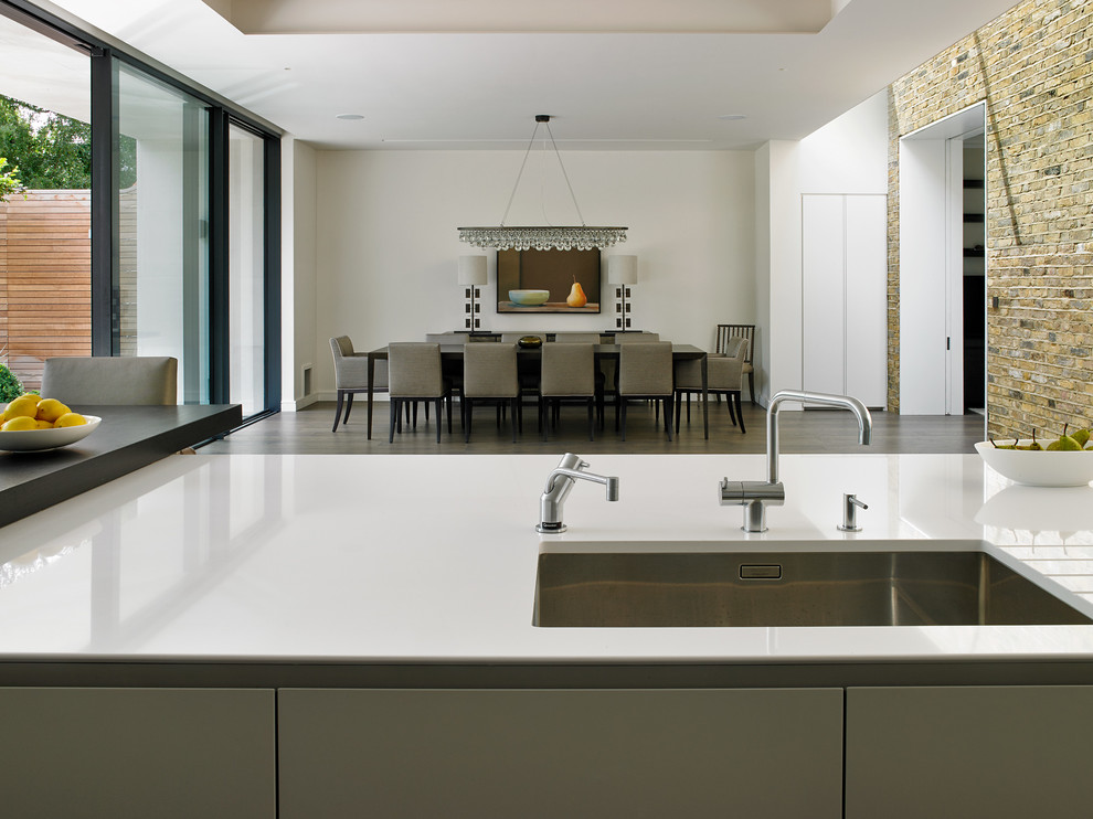 Design ideas for a medium sized contemporary kitchen in London with an island.