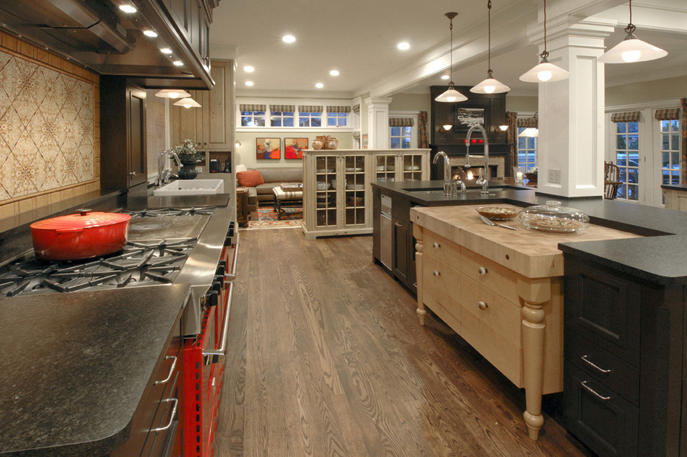 This is an example of a traditional open plan kitchen in Seattle with coloured appliances.