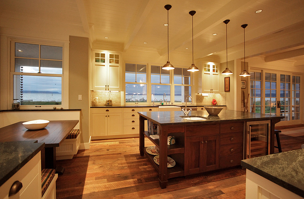 Inspiration for a timeless kitchen remodel in Seattle with white cabinets