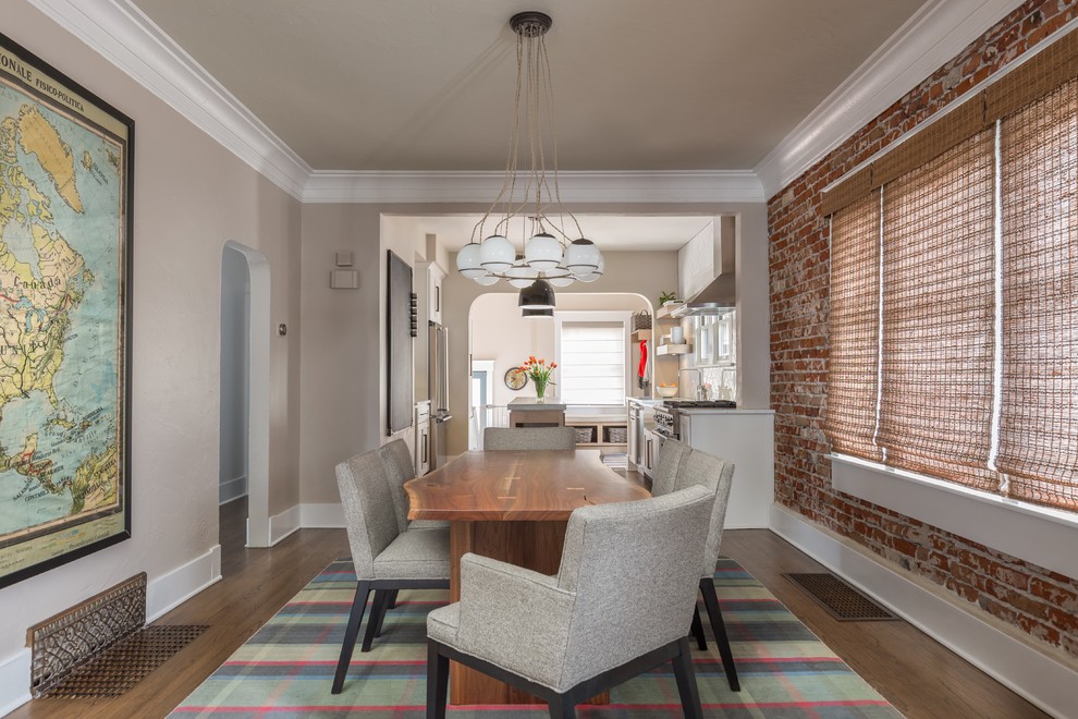 Inspiration for a transitional medium tone wood floor and brown floor kitchen/dining room combo remodel in Denver