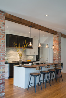 Gorgeous two story kitchen, granite countertops, pendant lighting, blue  mosaic backsplash tile, g…