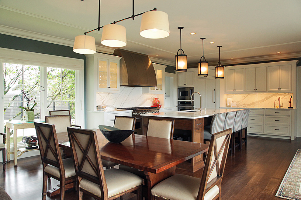 Inspiration for a contemporary eat-in kitchen remodel in Seattle with shaker cabinets, paneled appliances, white cabinets, marble countertops, white backsplash and stone slab backsplash