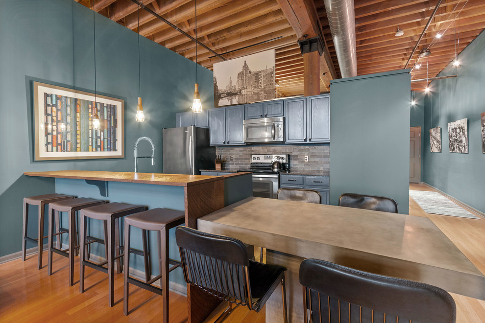 Water Street Condo Industrial Kitchen Milwaukee by Jerrica