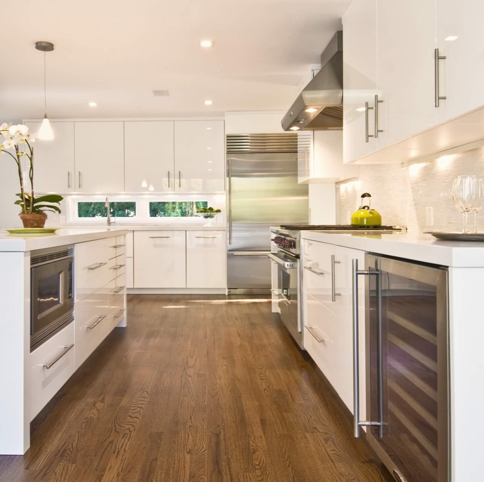 This is an example of a modern kitchen in New York with stainless steel appliances.