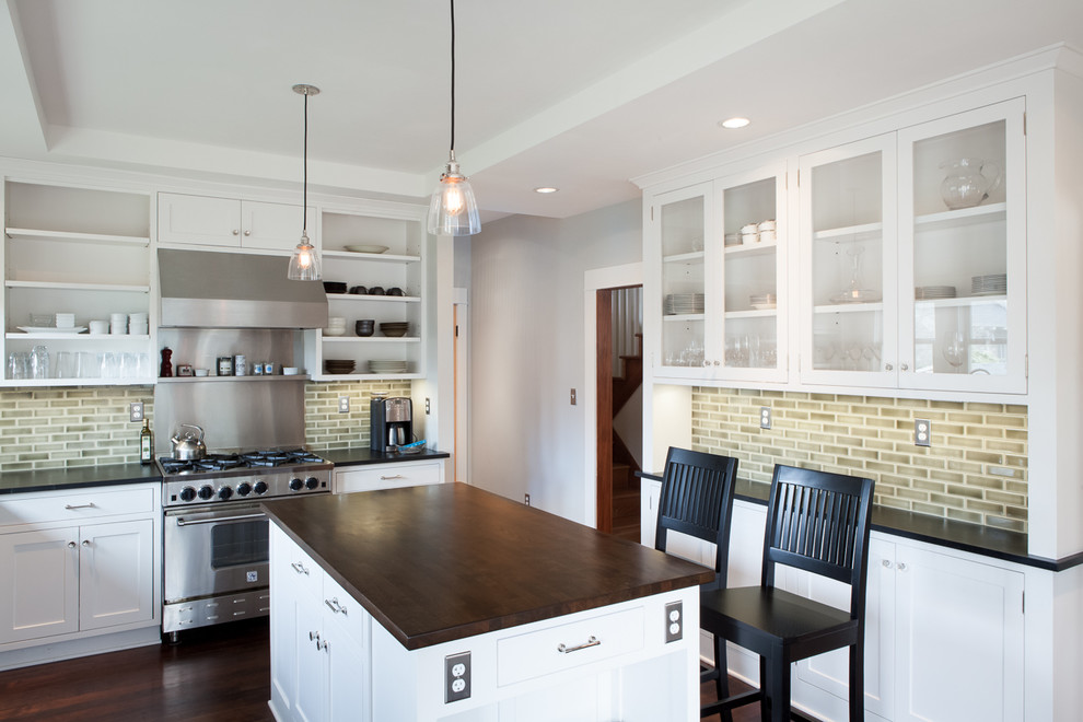 Inspiration for a contemporary kitchen remodel in Portland with open cabinets, white cabinets, wood countertops, brown backsplash, subway tile backsplash and stainless steel appliances