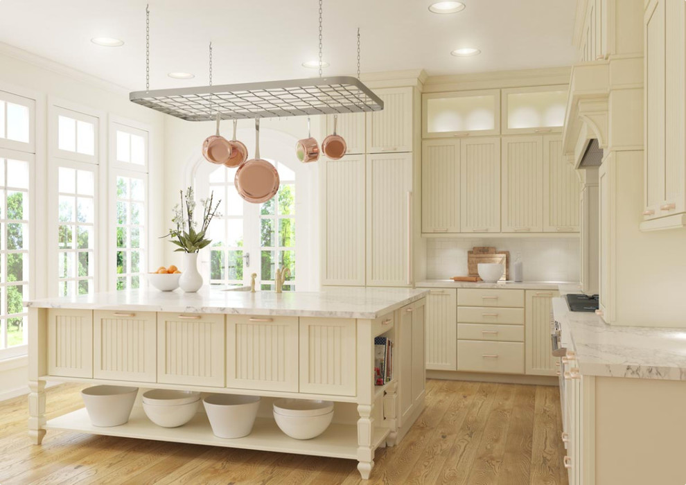 Eat-in kitchen - large traditional l-shaped light wood floor eat-in kitchen idea in Milwaukee with marble countertops, white backsplash, stainless steel appliances, an island, a farmhouse sink, louvered cabinets, white cabinets and subway tile backsplash