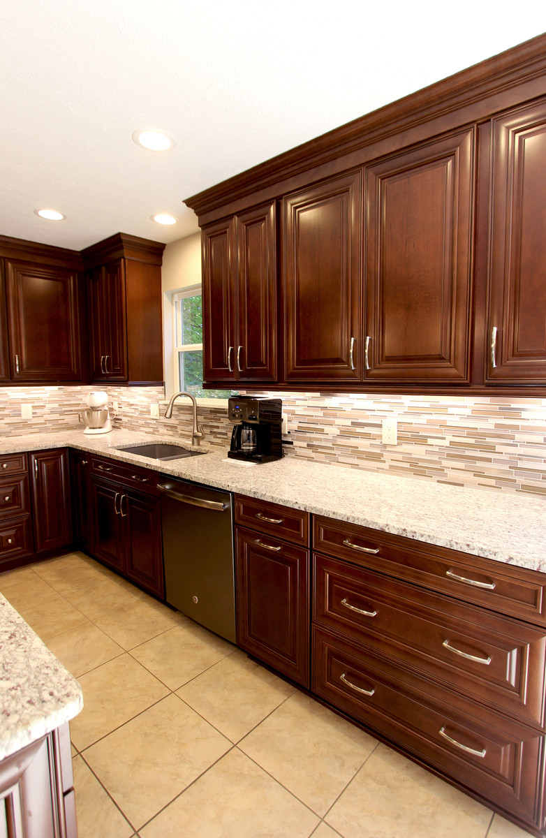 Waypoint Cherry Chocolate and Giallo Ornamental Granite