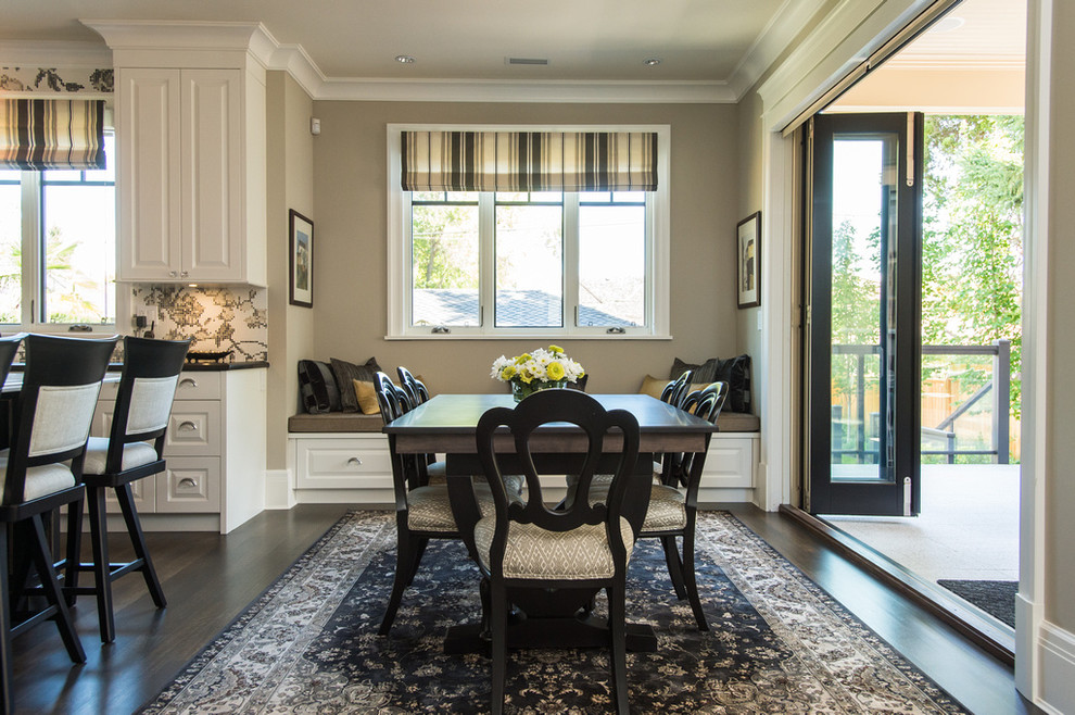 Photo of a medium sized classic open plan dining room in Vancouver with dark hardwood flooring.