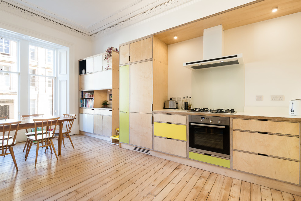 Large scandi l-shaped kitchen/diner in Glasgow.