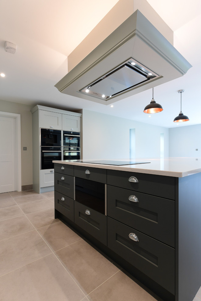 Inspiration for a contemporary porcelain tile and gray floor kitchen remodel in Oxfordshire with white backsplash and porcelain backsplash