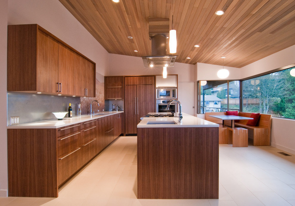 This is an example of a modern kitchen in Seattle with integrated appliances.