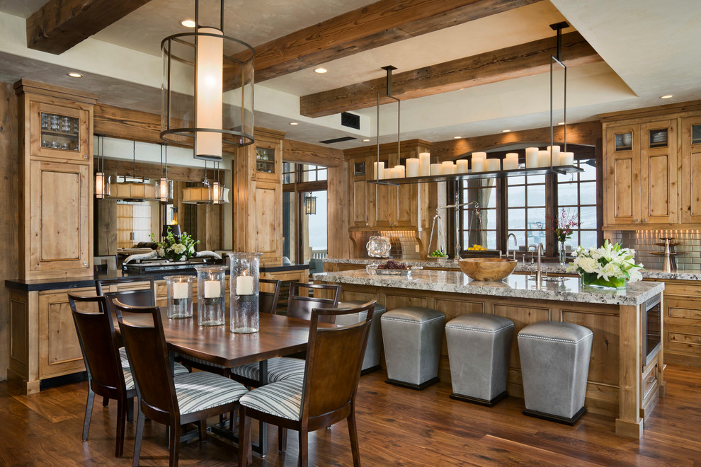Example of a mountain style eat-in kitchen design in Other with beaded inset cabinets, medium tone wood cabinets and subway tile backsplash
