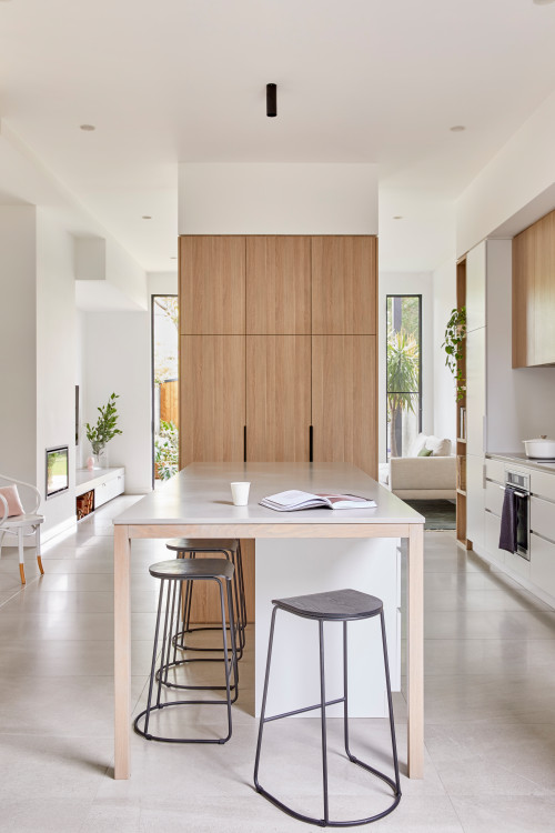 Elevate Your Space with Light Wood Kitchen Cabinets and a White Porcelain Tile Floor