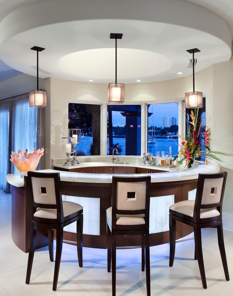 Inspiration for a contemporary kitchen remodel in Miami with dark wood cabinets