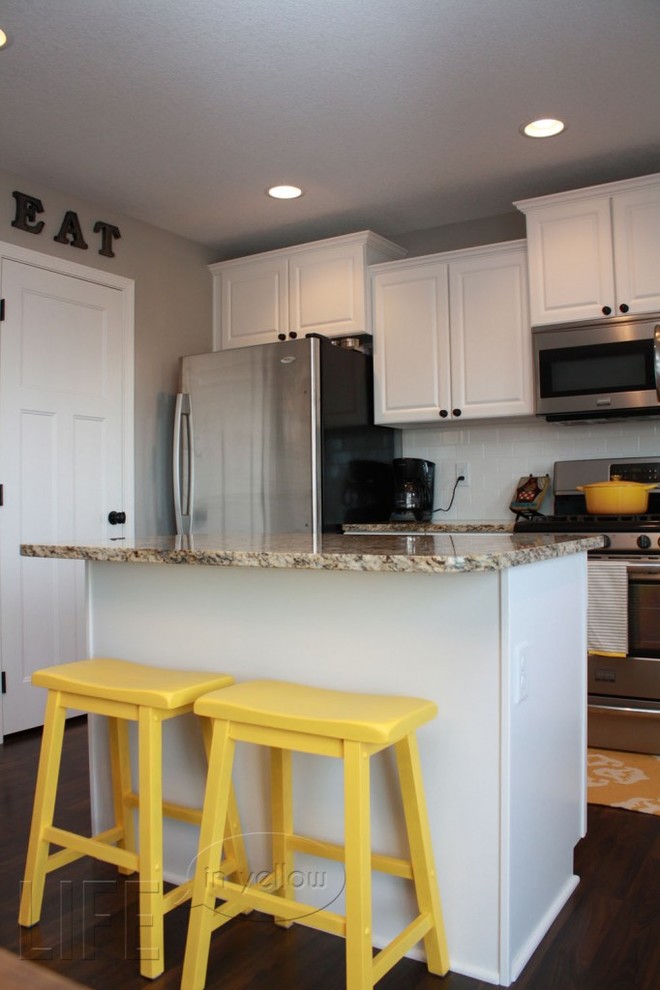 white and grey kitchen with yellow accents Traditional Kitchen