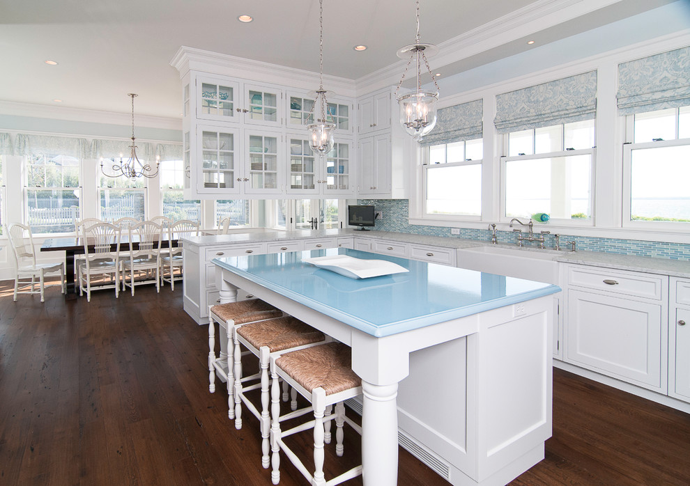 Inspiration for a timeless kitchen remodel in New York with recessed-panel cabinets, a farmhouse sink and blue countertops