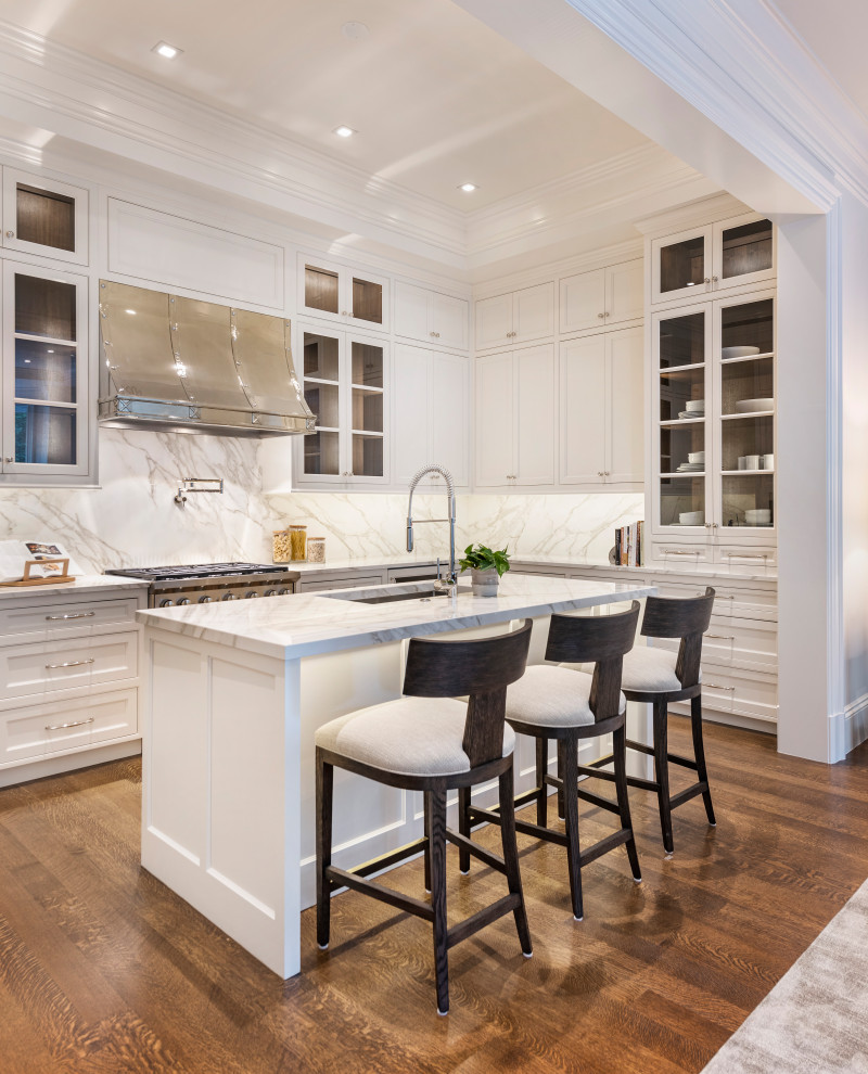 Traditional u-shaped kitchen/diner in Boston with a submerged sink, recessed-panel cabinets, white cabinets, composite countertops, grey splashback, stainless steel appliances, medium hardwood flooring, an island, grey worktops and a drop ceiling.