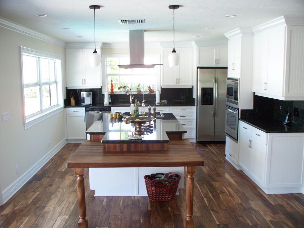 White Kitchen with Black Tabletop Traditional Kitchen
