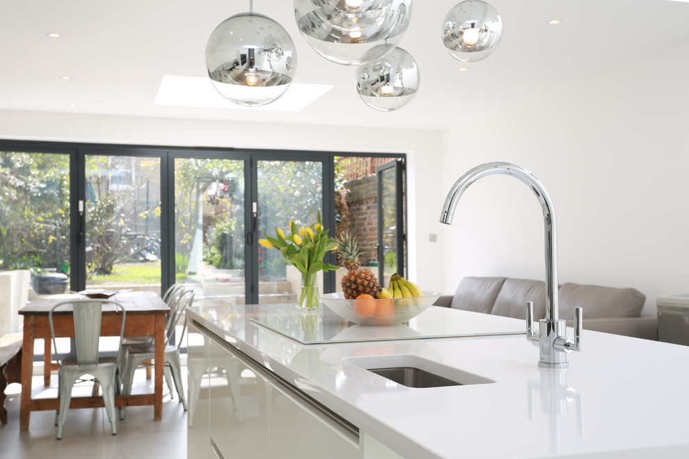 White gloss kitchen island Modern Kitchen London by LWK London