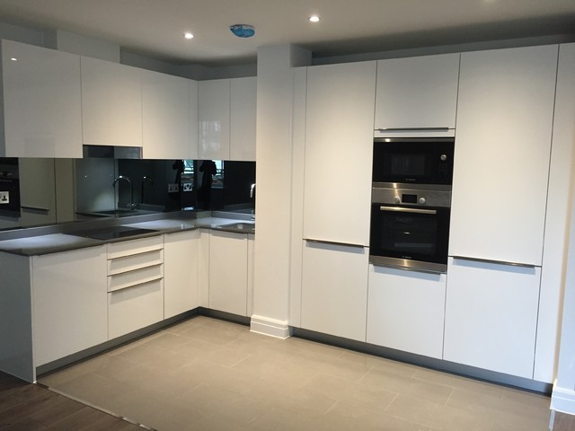 White gloss L shape open plan Kitchen Modern Kitchen London