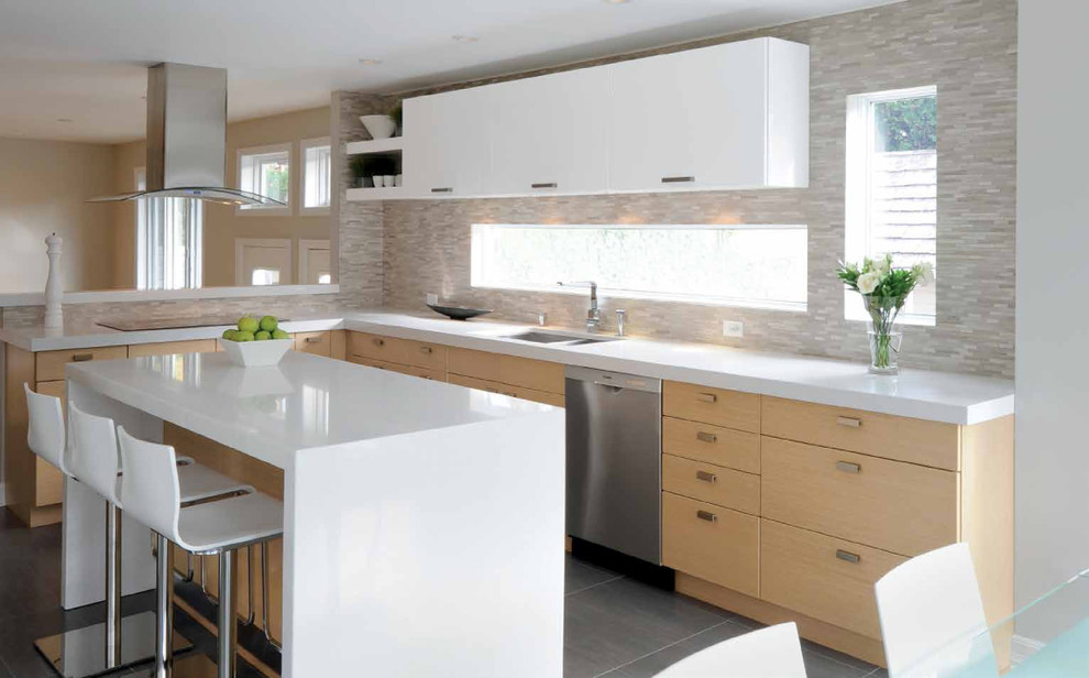 Transitional l-shaped eat-in kitchen photo in Salt Lake City with an undermount sink, flat-panel cabinets, light wood cabinets, quartzite countertops, multicolored backsplash, mosaic tile backsplash and stainless steel appliances
