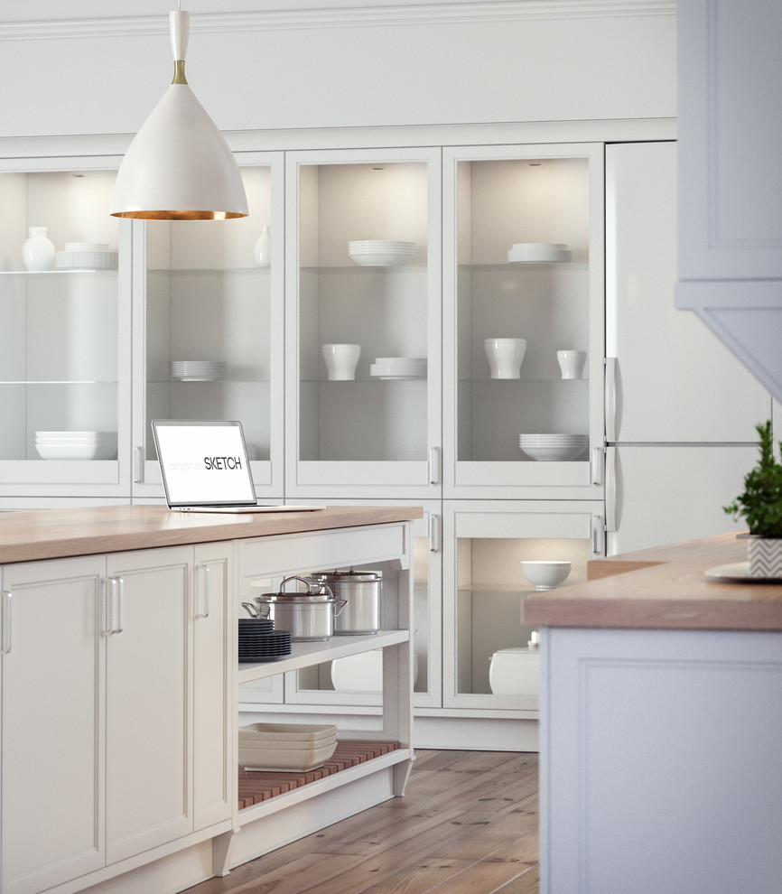 Bild på ett mellanstort funkis kök, med en nedsänkt diskho, luckor med infälld panel, vita skåp, träbänkskiva, vitt stänkskydd, stänkskydd i sten, rostfria vitvaror, ljust trägolv och en köksö
