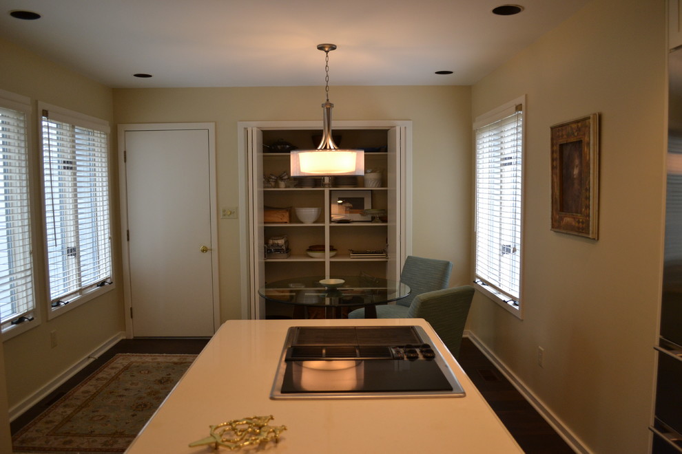 Transitional l-shaped open concept kitchen photo in Columbus with an undermount sink, shaker cabinets, white cabinets, quartz countertops, green backsplash, mosaic tile backsplash and stainless steel appliances