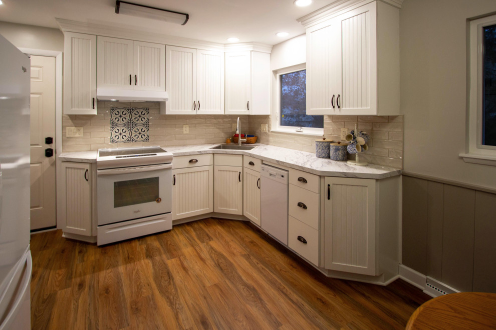 White Kitchen with Calcutta Marble Laminate Countertop and ...