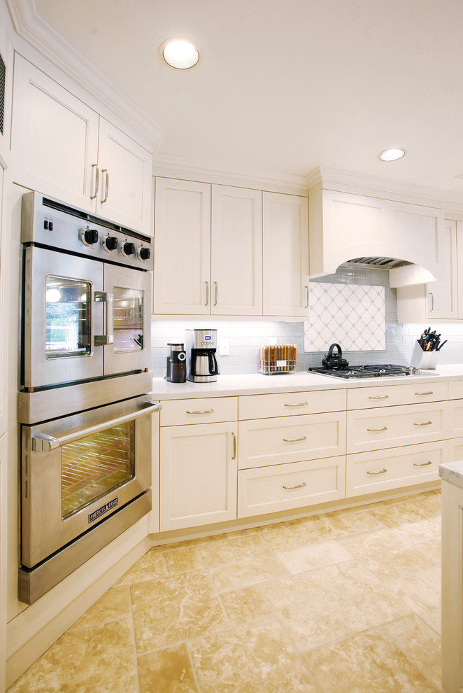 White Kitchen with White Cabinets and Stainless Steel ...