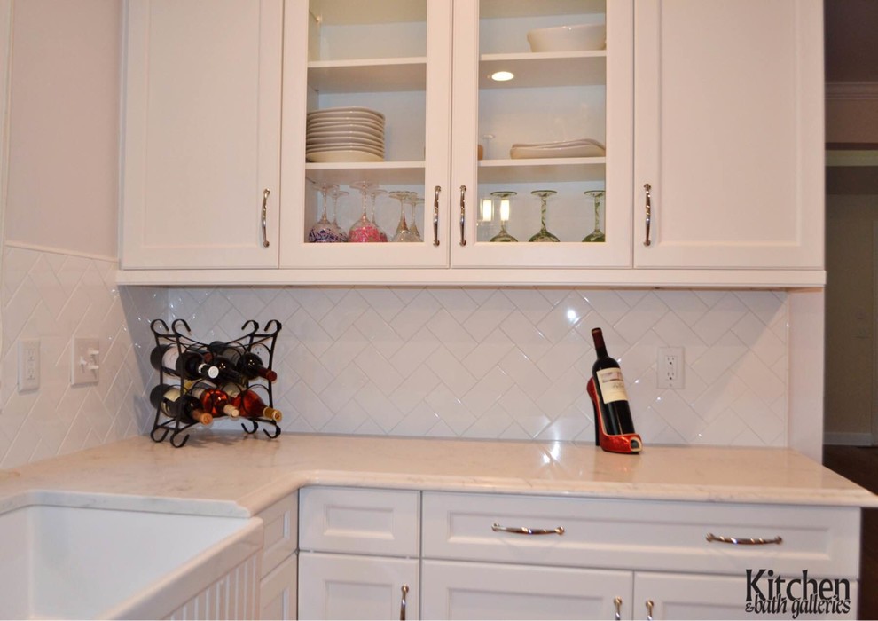 White Kitchen With Wood Island and Glass Door Refrigerator Kitchen