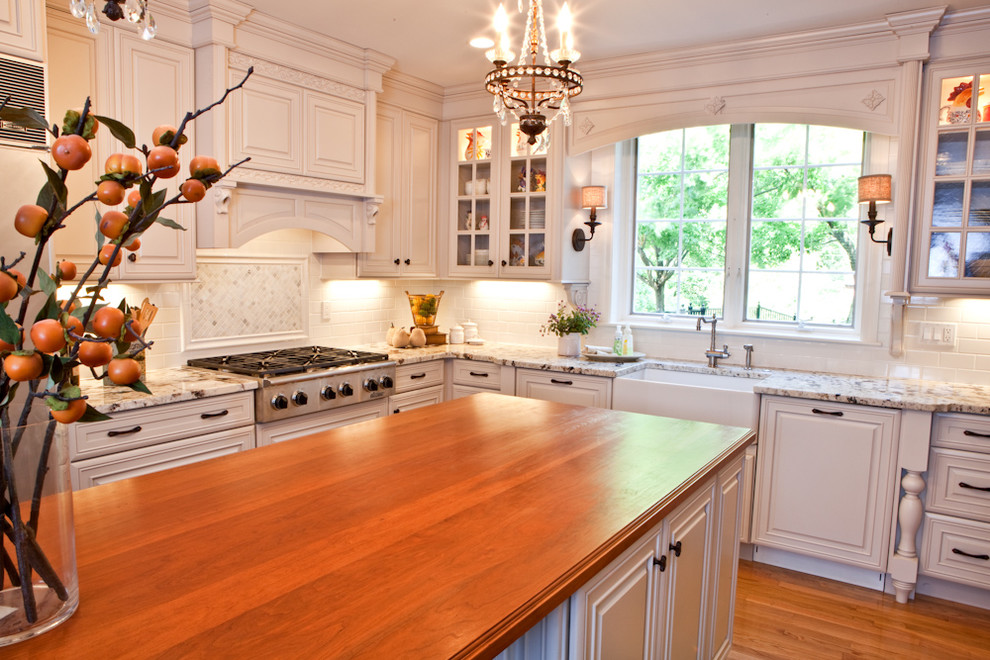 White Kitchen with Wood Island Remodel St. Louis, MO Traditional