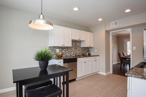 Clean modern Canadian kitchen with white RTA cabinets, demonstrating easy maintenance and long-lasting durability