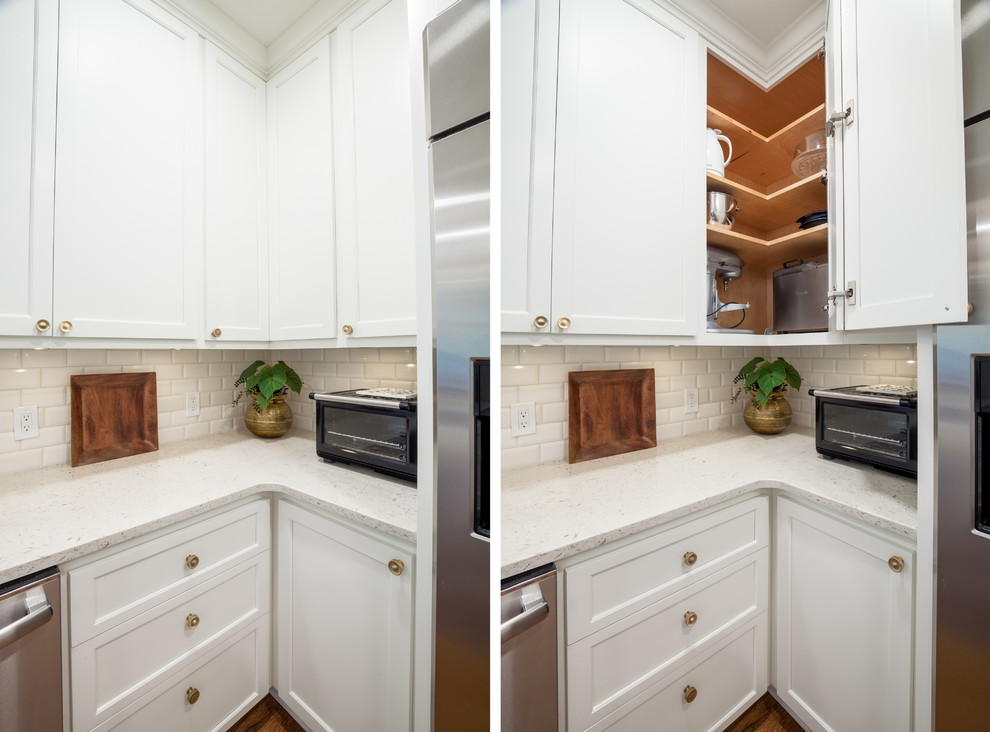 Mid-sized transitional u-shaped medium tone wood floor and brown floor open concept kitchen photo in Atlanta with an undermount sink, shaker cabinets, white cabinets, quartzite countertops, white backsplash, subway tile backsplash, stainless steel appliances, an island and white countertops