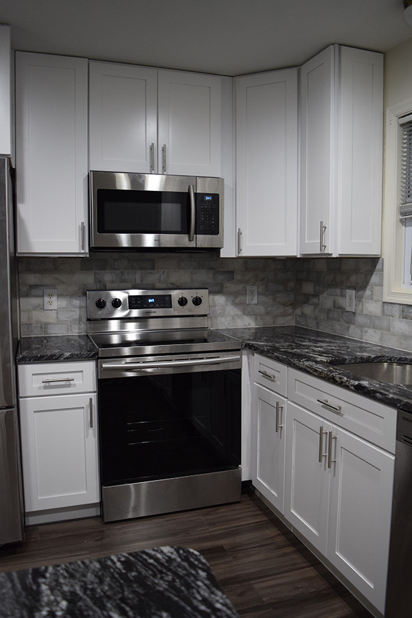 White Shaker Kitchen With New Dark Grey, Gray Laminate Flooring Kitchen