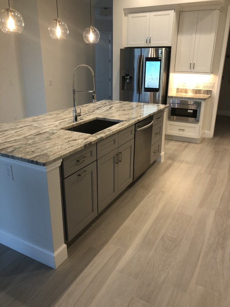 White Shaker Style with Gray Countertops Traditional
