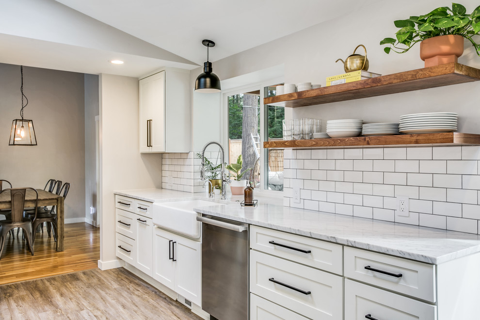 White Transitional Galley Kitchen And Outdoor Living Space Transitional Kitchen Seattle By Community Builders Llc