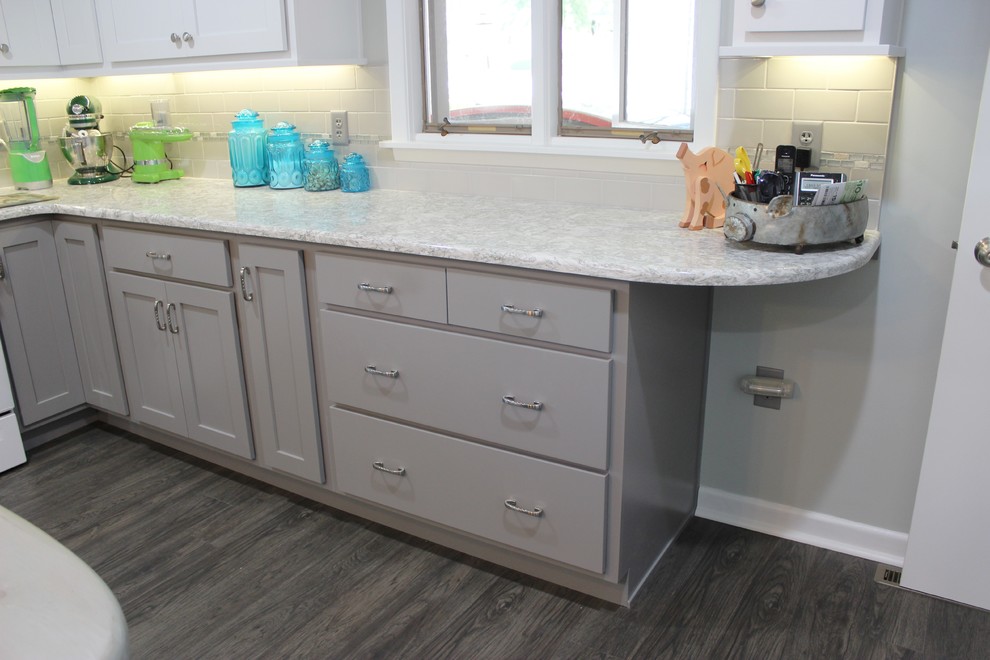 White Upper and Gray Base Kitchen With Quartz Counters