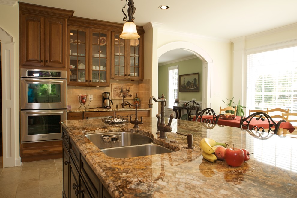 Williamsburg Cherry Kitchen with Black island Traditional Kitchen