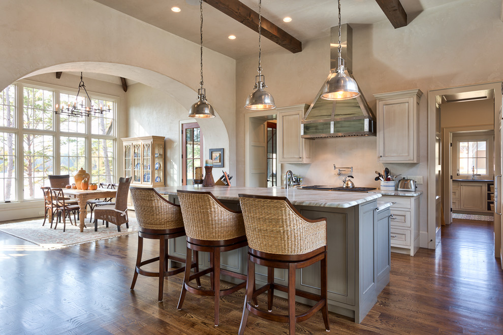 Mid-sized transitional galley dark wood floor eat-in kitchen photo in Other with beaded inset cabinets, an island, distressed cabinets, marble countertops, stainless steel appliances and an undermount sink