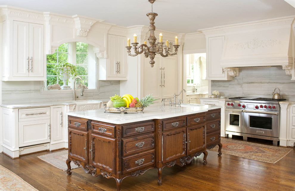 Example of an ornate kitchen design in Dallas with quartzite countertops
