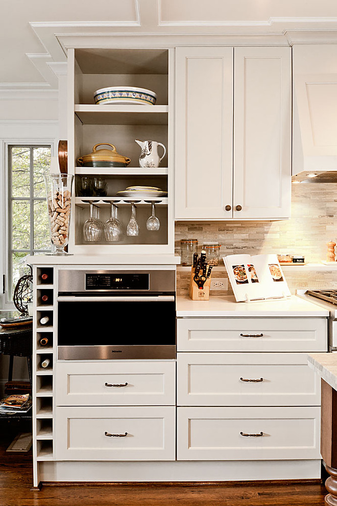 Example of a classic kitchen design in Atlanta with stainless steel appliances