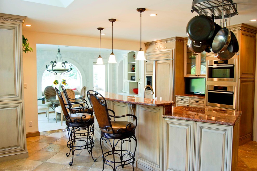Example of a tuscan kitchen design in Other