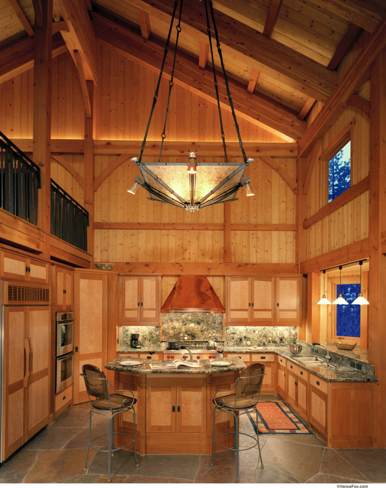 Inspiration for a rustic u-shaped kitchen remodel in Sacramento with shaker cabinets, medium tone wood cabinets and an island