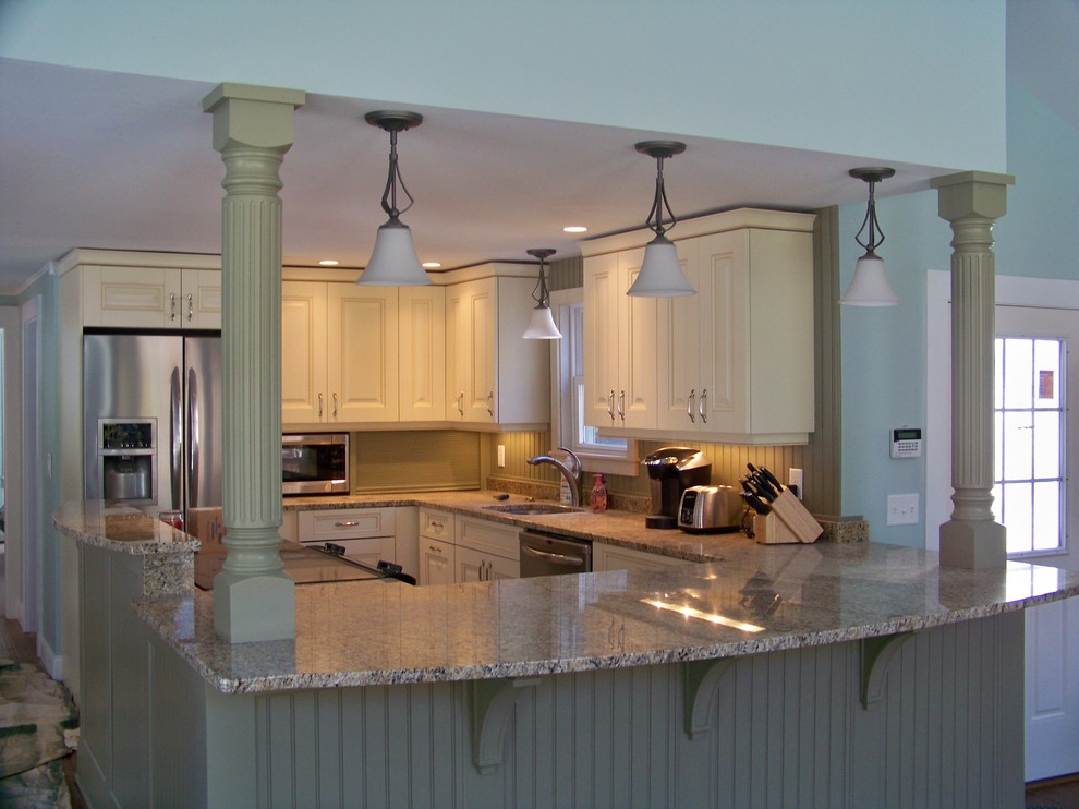This is an example of a small classic kitchen in Portland Maine.