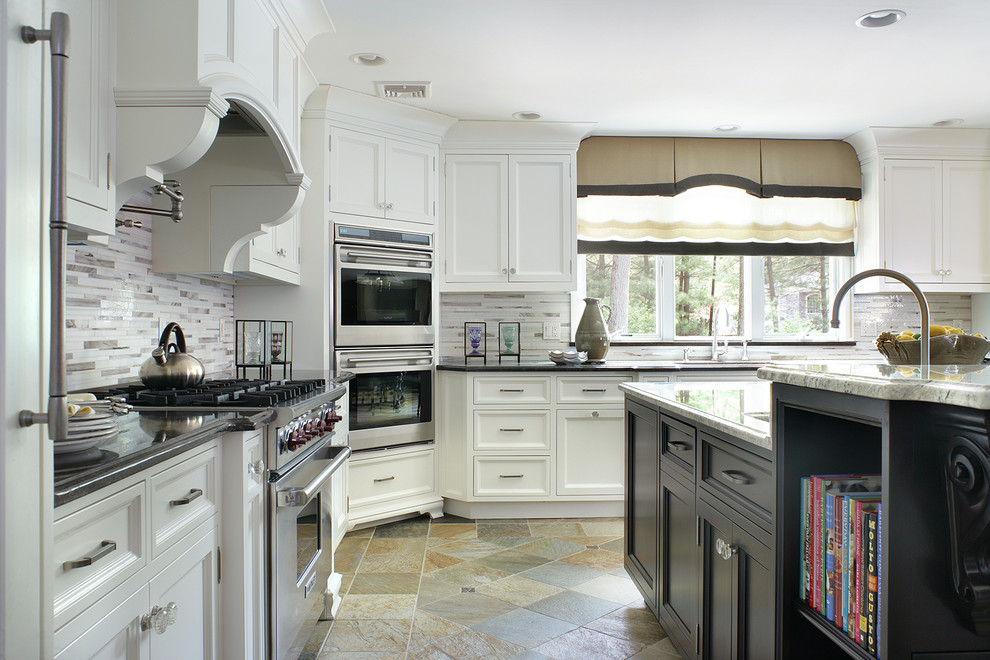 This is an example of a traditional l-shaped open plan kitchen in New York with a submerged sink, shaker cabinets, white cabinets, granite worktops, white splashback, metro tiled splashback, stainless steel appliances, ceramic flooring and an island.